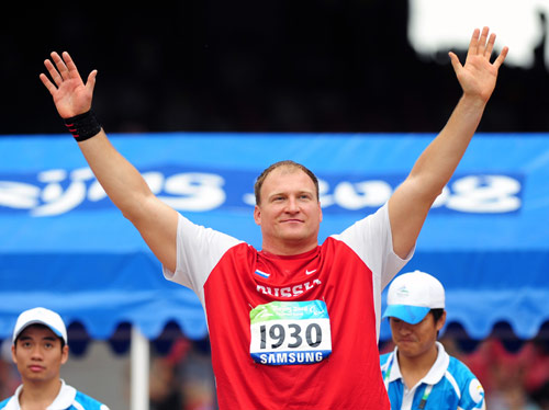  Alexey Ashapatov celebrates for his victory at the National Stadium, also known as the Bird's Nest, in Beijing on September 9, 2008. 