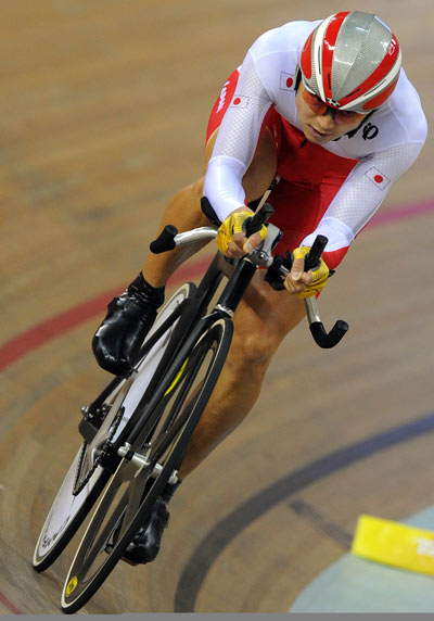 Japan's Ishii Masashi finished in a new world record time of one minute and 8.771 seconds to claim the Men's Cycling Track 1km Time Trial (CP4) gold medal on September 9, 2008.