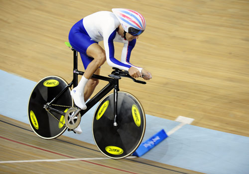 Britain's Darren Kenny finished in one minute and 8.668 seconds to claim the Men's Cycling Track 1km Time Trial (CP3) gold medal on September 9, 2008. 