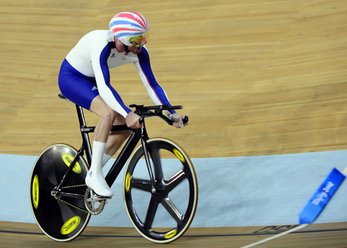 Britain's Darren Kenny finished in one minute and 8.668 seconds to claim the Men's Cycling Track 1km Time Trial (CP3) gold medal on September 9, 2008. 