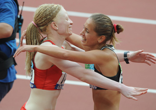 Oxana Boturchuk (R) is congratulated.