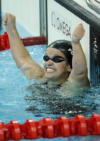 Erin Popovich of the United States wins the gold medal of the SB7 final of Women's 100m Breaststroke.[Xinhua]