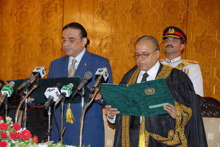 Pakistan People's Party Co-Chairman Asif Ali Zardari (L) is sworn in as Pakistan's new president in Islamabad, capital of Pakistan, Sept. 9, 2008. (Xinhua/Pakistan's Press Information Department)