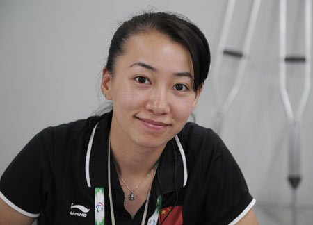 Chinese Paralympian fencer, Jin Jing, poses for picture before she took part in the torch relay at the opening ceremony of the 2008 Beijing Paralympics Sept. 6, 2008. Jin lost her right leg to a malignant tumor at the age of 18 and now uses a wheelchair. She moved people by protecting the Olympic torch from attackers in the Paris leg of the torch relay.