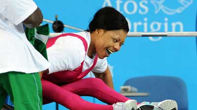 Lucy Ogechukwu Ejike of Nigeria wins Women's 48kg Group A Powerlifting gold