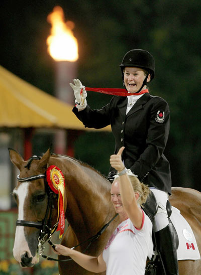  Canadian rider Lauren Barwick wins the gold in the Individual Freestyle Test (Grade II). [Xinhua]