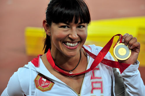 Photos: Chantal Petitclerc wins Women's 100m T54 gold