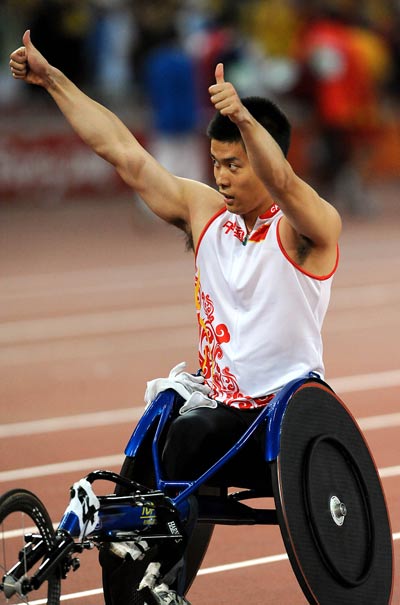 Photos: China's Zhang Lixin wins Men's 400m T54 gold