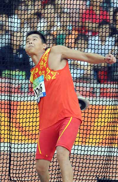 Photos: Guo Wei of China wins Men's Discus Throw F35/36 gold