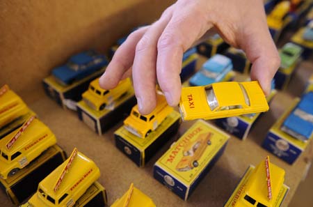 A matchbox toy taxi valued at 3,000 pounds ($5,265) is seen at Vectis in Thornaby, northern England September 10, 2008. 