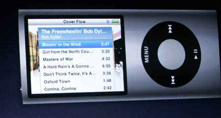 A redesigned iPod Nano is shown projected on a screen at Apple