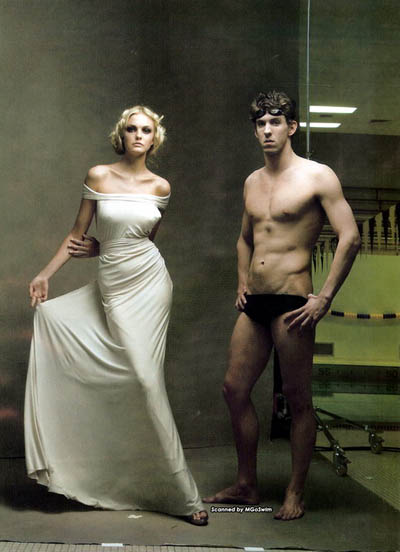Michael Phelps poses for photos with model Caroline Trentini.