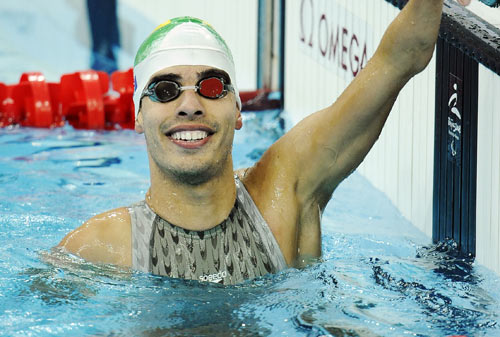 Dianiel Dias of Brazil smiles after the SM5 final. He claimed the title and broke the world record of the Men's Swimming 200m Individual Medley SM5 with a time of 2:52.60 during the Beijing 2008 Paralympic Games at the National Aquatics Center in Beijing on September 11, 2008.