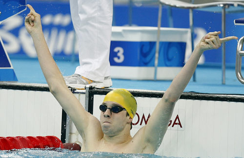 Peter Leek of Australia celebrates his victory. He claimed the title and broke the world record of the Men's Swimming 200m Individual Medley SM8 with a time of 2:20.92 seconds during the Beijing 2008 Paralympic Games at the National Aquatics Center on September 11, 2008. 