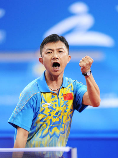 Chen Gang of China celebrates. He beat Piotr Grudzien of Poland 3-1 to claim the title of the Men's Table Tennis Individual Class 8 at the Beijing 2008 Paralympic Games on September 11, 2008. 