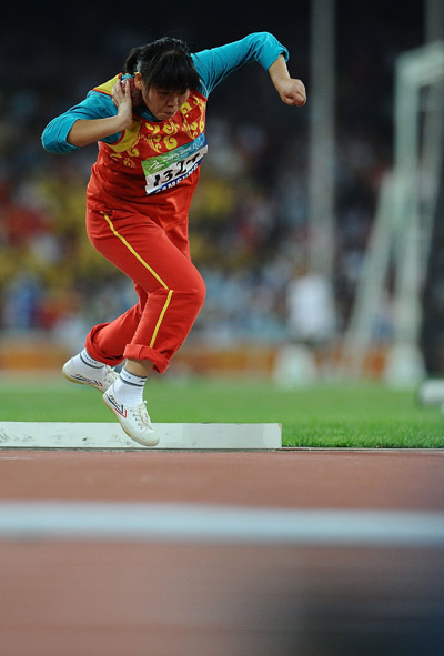 China's Mi Na won the gold medal of Women's Shot Put F37/38 with 11.58 meters and set a new world record at the National Stadium,also known as the Bird's Nest,during the Beijing 2008 Paralympic Games on Thursday, September 11.