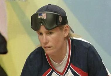 Wearing No.1 team T-shirt, with blue hat, 33-year-old Jen Armbruster stands out in the USA goalball team.