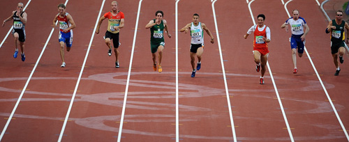 Athletes compete for the Men's 100m-T37 gold medal at the National Stadium,also known as the Bird's Nest, during the Beijing 2008 Paralympic Games on September 12, 2008.