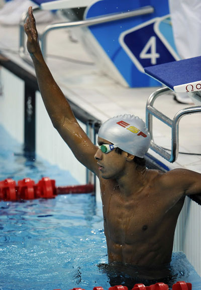 Enhamed Enhamed of Spain set a new Paralympic record and won S11 gold. The Men's 100m Freestyle Swimming finals of the Beijing 2008 Paralympic Games were held at the National Aquatics Center in Beijing on September 12, 2008.
