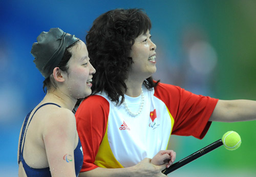 China's Xie Qing won S11 gold and broke the world record. Women's 100m Individual Freestyle finals of the Beijing 2008 Paralympic Games Swimming event were held at the National Aquatics Center on September 12, 2008. 