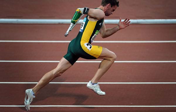 Heath Francis of Australia competes during the men&apos;s 400m-T46 final at the National Stadium，also known as the Bird&apos;s Nest，during the Beijing 2008 Paralympic Games in Beijing, China, Sept. 12, 2008. Francis won the gold with 47.69 secs. (Xinhua/Guo Dayue)
