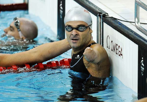 Ricardo Ten of Spain celebrates after the SB4 final of men&apos;s 100m breaststroke during the Beijing 2008 Paralympic Games at the National Aquatics Center in Beijing, China, Sept. 12, 2008. Ten claimed the title of the event with a time of 1:36.61.