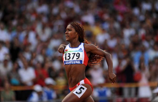 Yunidis Castillo of Cuba competes during the women&apos;s 200m-T46 final at the National Stadium，also known as the Bird&apos;s Nest，during the Beijing 2008 Paralympic Games in Beijing, China, Sept. 12, 2008. Castillo set a new world record with 24.72 secs and won the gold. (Xinhua/Li Ga) 