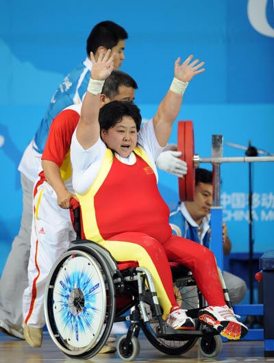 Photos: China's Li Ruifang wins Women's +82.50 kg Powerlifting gold