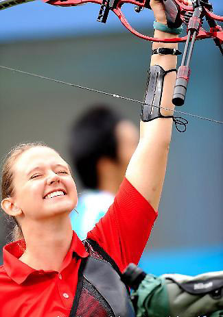 Lindsey Carmichael of the United States celebrates during women's individual recurve standing bronze medal match of the Beijing 2008 Paralympic Games archery event in Beijing, China, Sept. 13, 2008. Carmichael defeated Malgorzata Olejnik of Poland in the match and won the bronze. [Xinhua]