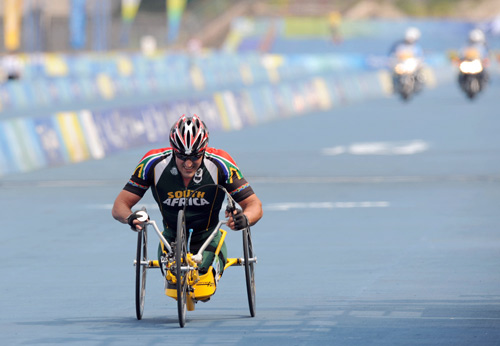  Ernst van Dyk of South Africa wins the gold medal in the Men's Individual Road Race HC C. (Photo credit: Xinhua)