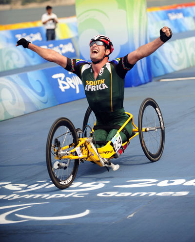 Ernst van Dyk of South Africa wins the gold medal in the Men's Individual Road Race HC C. (Photo credit: Xinhua)