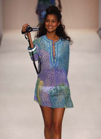 A model presents a creation of designer Caroline Charles' Spring and Summer 2009 collections during the opening of the London Fashion Week in London Sept. 14, 2008.