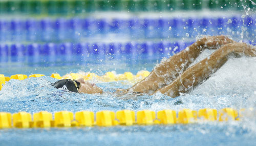 Dmitry Kokarev of Russia won the gold medal in the S2 final of Men's 50m Backstroke.[Xinhua]