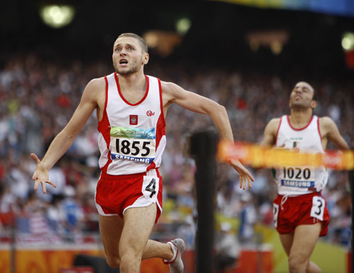 Marcin Awizen of Poland wins the gold medal in Men’s 800m T46.[Xinhua]