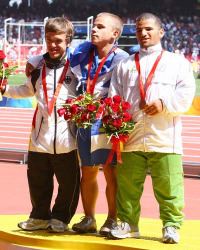 Paschalis Stathelakos (C), Marthias Mester (L) and Hocine Gherzouli. [Xinhua]