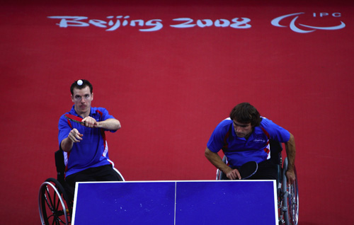 Jean-Phillippe Robin (L) serves. Jean-Philippe Robin and Florian Merrien of France beat Luiz Algacir Silva and Welder Knaf of Brazil 3-1 in the Men's Table Tennis Team Class 3 final at the Beijing 2008 Paralympic Games on September 15, 2008, claiming the gold medal.