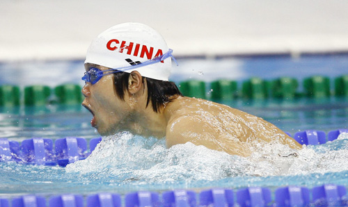 Tang Yuan of the Chinese team competes competes. The Chinese team set a new world record and claimed the title of the Men's 4 x 50m Medley 20pts with a time of 2 minutes and 33.15 seconds during the Beijing 2008 Paralympic Games, at the National Aquatics Center, in Beijing on September 15, 2008. 