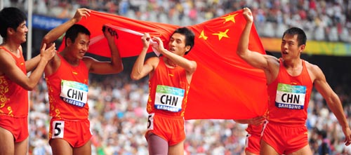 The Chinese team celebrates. [Xinhua]