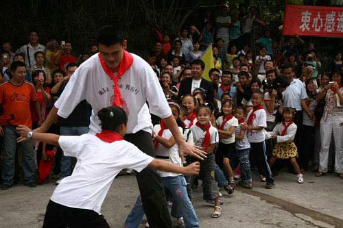 Yao Ming participates in a short ceremony at the Jianshecun Village Elementary School, the first school built from Yao Ming's donations to the earthquake-hit region. 