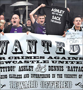 Newcastle United fans protest outside St James' Park, ahead of the English Premier League soccer match between Newcastle and Hull City, at Newcastle, England on Saturday.