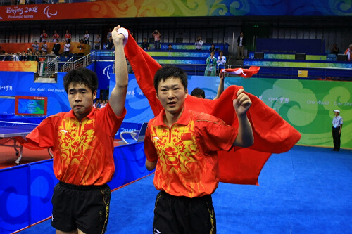 Ma Lin (L) and Ge Yang celebrate.[Xinhua]