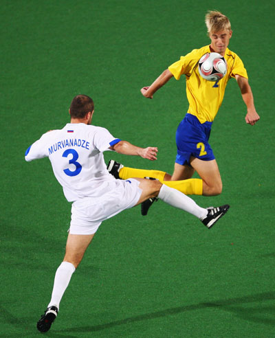 Vitaliy Trushev (R) of Ukraine and Lasha Murvanadze of Russia compete. Ukraine beat Russia 2-1 in the Men's Football 7-a-side gold medal match during the Beijing 2008 Paralympic Games on September 16, 2008.