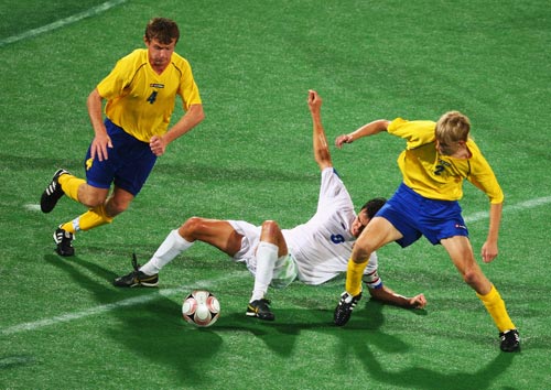 Taras Dutko (L), Vitaliy Trushev (R) of Ukraine and Ivan Potekhin of Russia compete. Ukraine beat Russia 2-1 in the Men's Football 7-a-side gold medal match during the Beijing 2008 Paralympic Games on September 16, 2008.