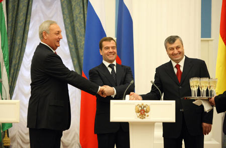 Russian President Dmitry Medvedev and the leaders of Georgia's breakaway regions -- South Ossetia and Abkhazia -- signed treaties of friendship, cooperation and mutual assistance here Wednesday.