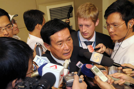 Yang Chongyong, Vice Governor of North China's Hebei Province, answers questions from reporters about melamine-contaminated milk after a press conference held by the State Council Information office of China in Beijing, September 17, 2008.