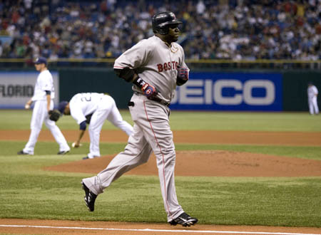 Boston Red Sox David Ortiz runs towards home plate after hitting a home run against the Tampa Bay Rays during the first inning of their American League baseball game in St. Petersburg, Florida September 17, 2008.