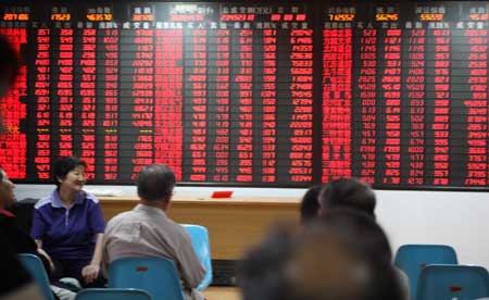 Investor are watching market formation in Beijing on Thursday Sept. 19, 2008. China stock prices soared 9.06 percent at opening on Friday after the government moved to scrap the stamp tax on stock purchase, effective Friday, in a move to boost the equities market. [Xinhua]