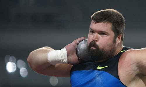Christian Cantwell of the United States competes during the men's shot put of the 2008 Shanghai Golden Grand Prix track and field event in Shanghai, China, Sept. 20, 2008. Christian Cantwell won the title with 20.84 metres.