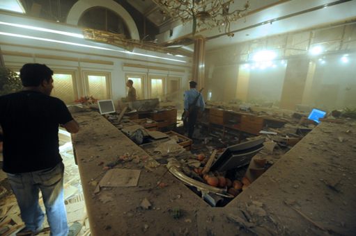 Pakistani employees gather in the reception of The Marriott Hotel in Islamabad on September 20, 2008, following a powerful bomb blast. At least 40 people were killed in a massive bomb blast at the hotel in the Pakistani capital which was feared to collapse and authorities were asking the people and media to stay away, police and fire department officials told AFP.