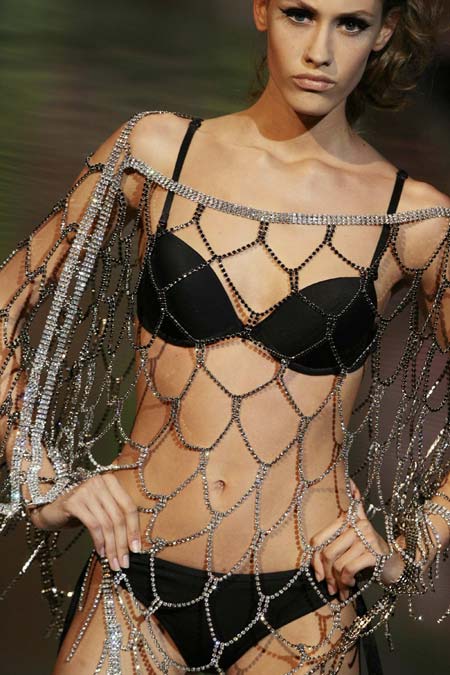 A model displays a creation as part of Seduzioni Diamonds Valeria Marini Spring/Summer 2009 women's collection during Milan Fashion Week September 20, 2008.